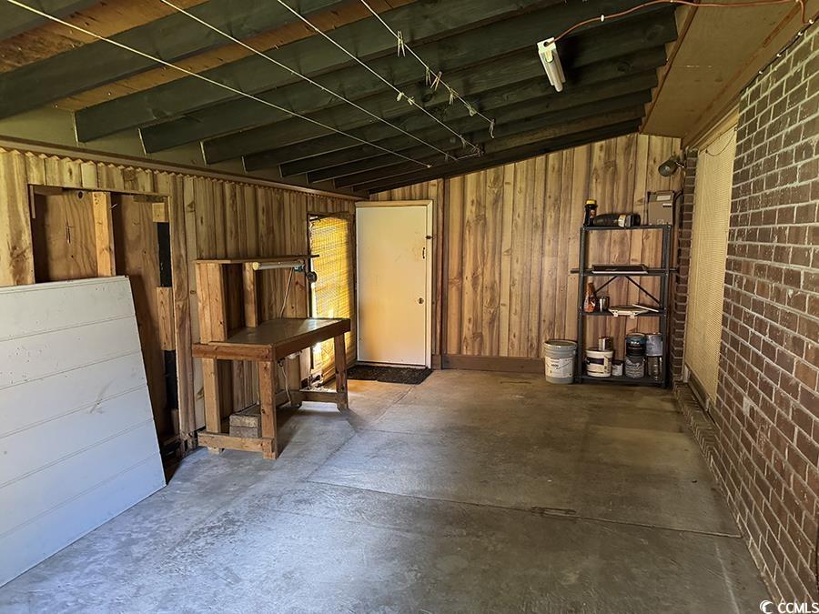 4041 Long Line Lane Myrtle Beach, SC 29579 - Photo 11 of 20 Workshop featuring wood walls