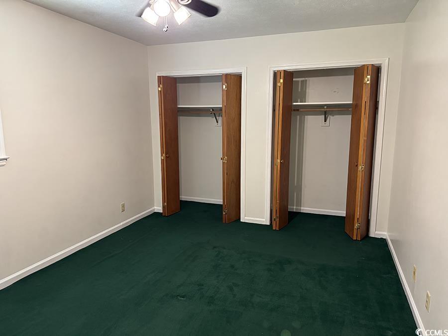 4041 Long Line Lane Myrtle Beach, SC 29579 - Photo 6 of 20 Unfurnished bedroom featuring multiple closets, ca