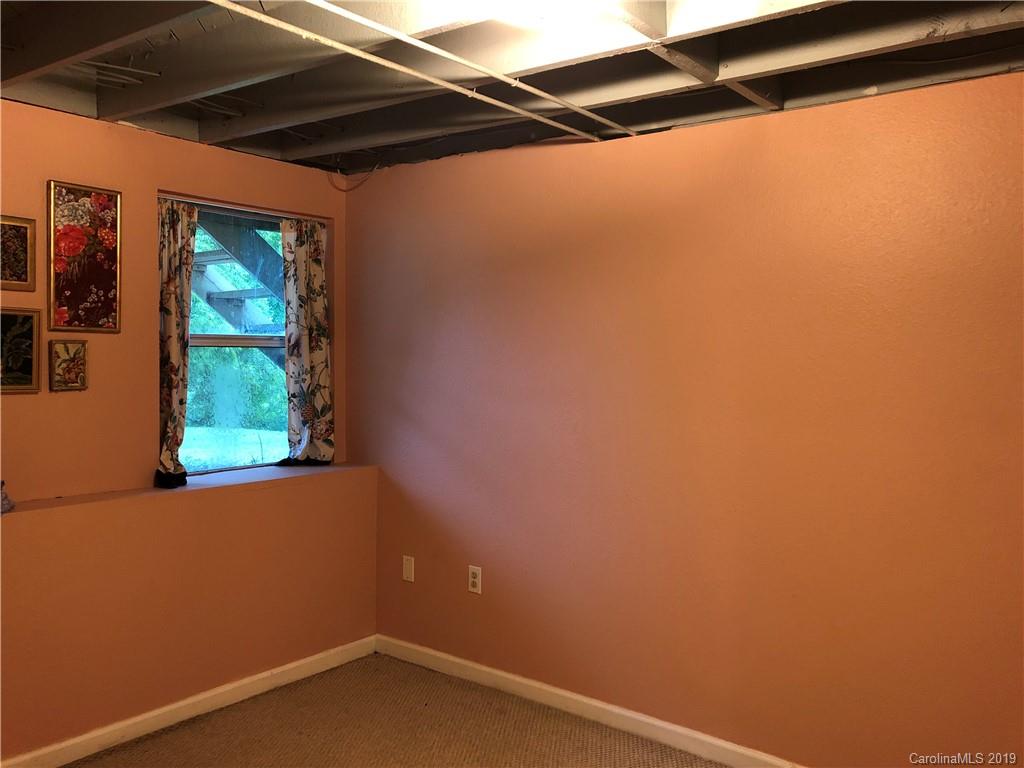 87 Cresent Loop Canton, NC 28716 - Photo 23 of 31 a view of a window in an empty room