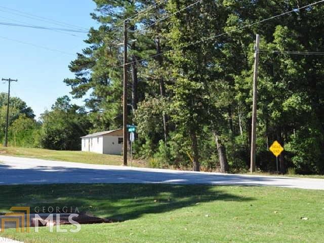 3312 South McKoy Road Villa Rica, GA 30180 - Photo 5 of 17 a view of swimming pool and trees in the background