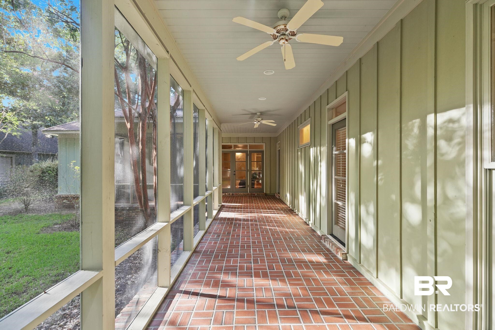 202 Beall Lane Daphne, AL 36526 - Photo 35 of 46 Unfurnished sunroom featuring ceiling fan