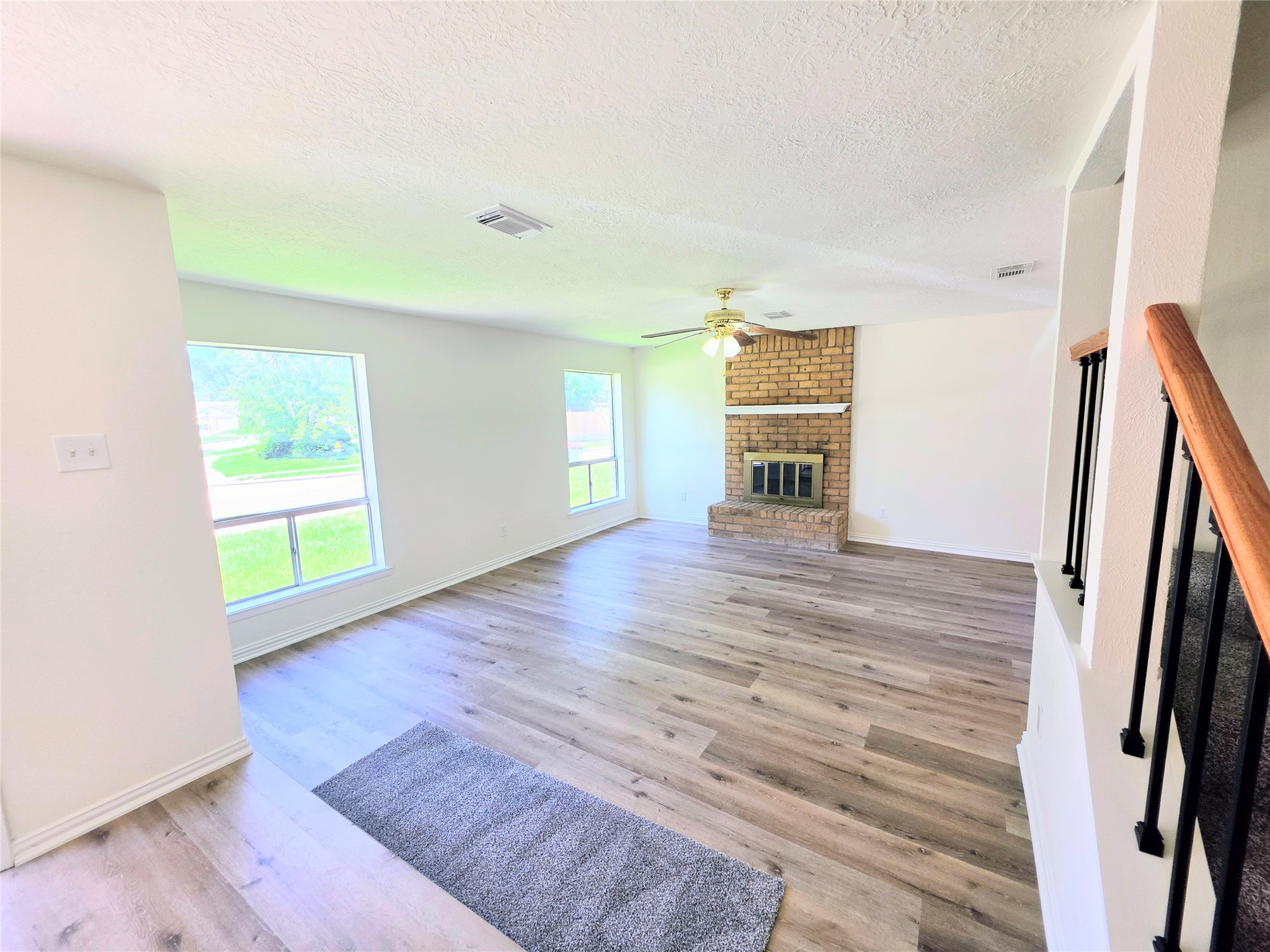 24022 Spring Briar Lane Spring, TX 77373 - Photo 4 of 35 Brand new floors and paint throughout. Large picture windows for lots of natural light