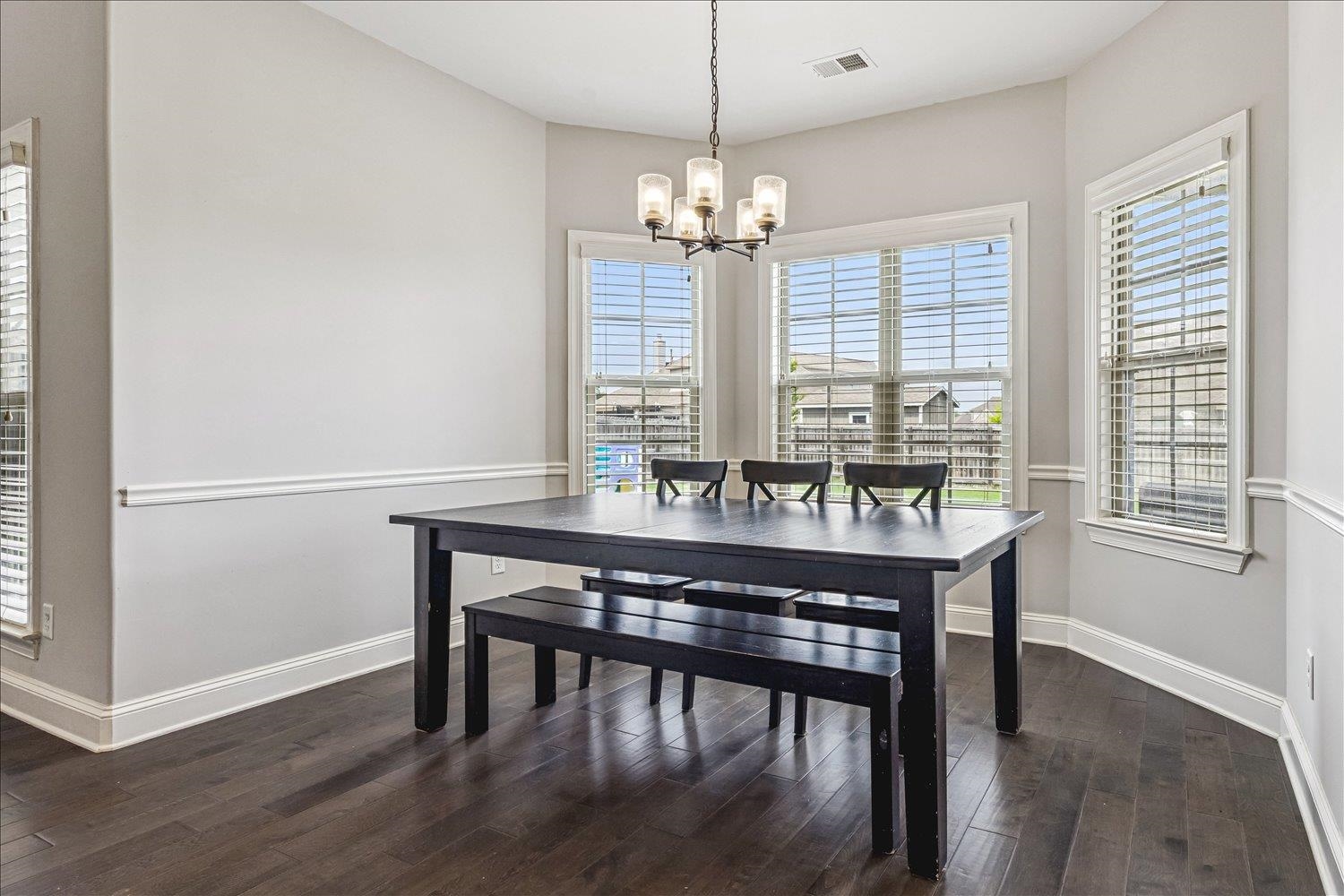 12802 Longmire Loop South Arlington, TN 38002 - Photo 14 of 40 a view of a dining room with furniture window and wooden floor