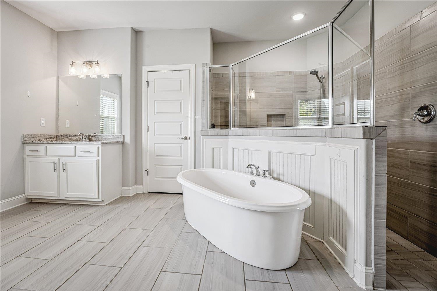 12802 Longmire Loop South Arlington, TN 38002 - Photo 19 of 40 a bathroom with a sink a toilet and shower