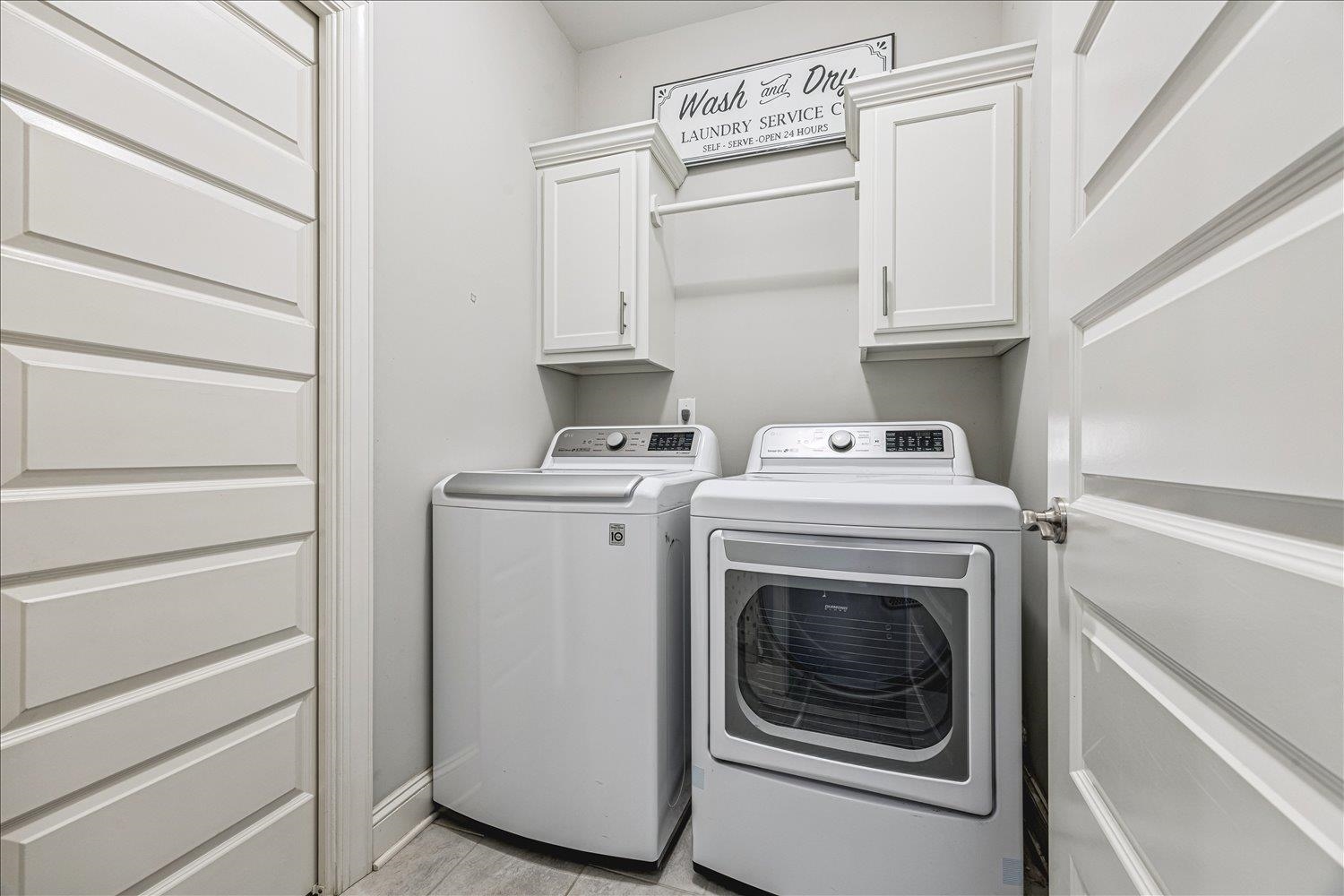 12802 Longmire Loop South Arlington, TN 38002 - Photo 27 of 40 a utility room with dryer and washer