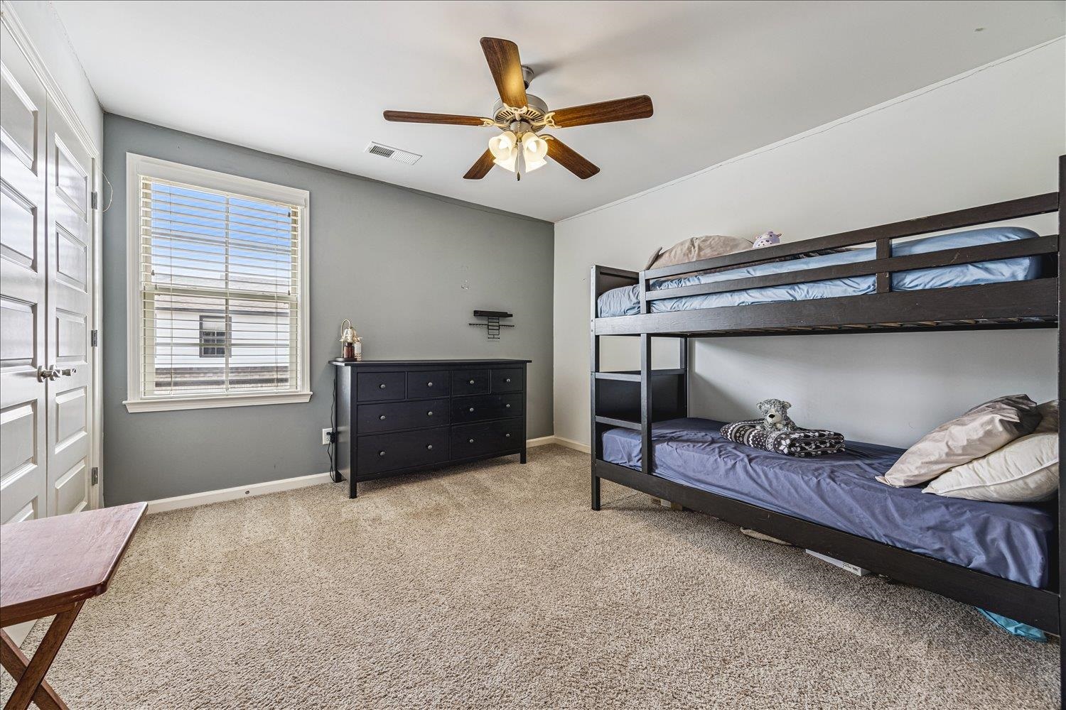 12802 Longmire Loop South Arlington, TN 38002 - Photo 32 of 40 a bedroom with a bed and a window