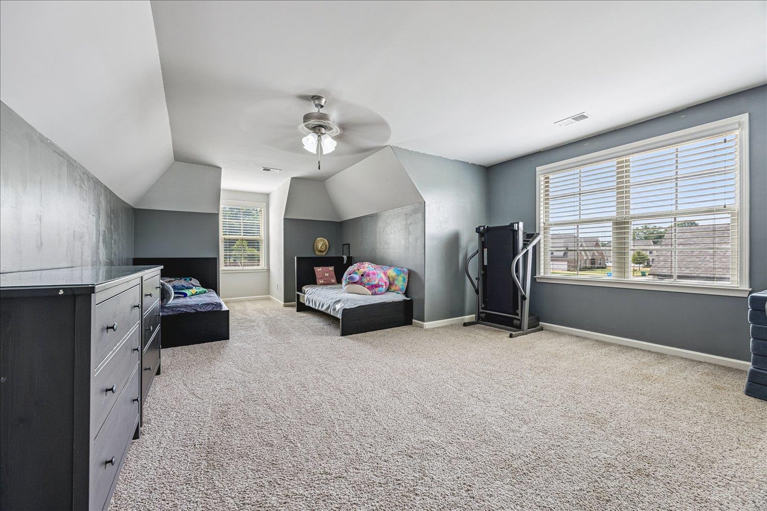 12802 Longmire Loop South Arlington, TN 38002 - Photo 33 of 40 a living room with furniture and a large window