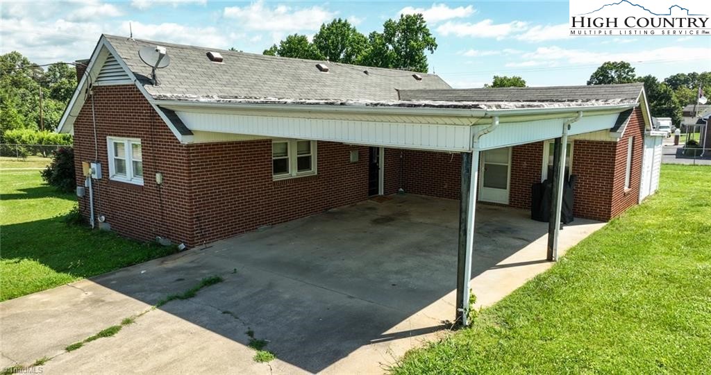 820 Suncrest Orchard Road North Wilkesboro, NC 28659 - Photo 11 of 41 a view of a house with backyard
