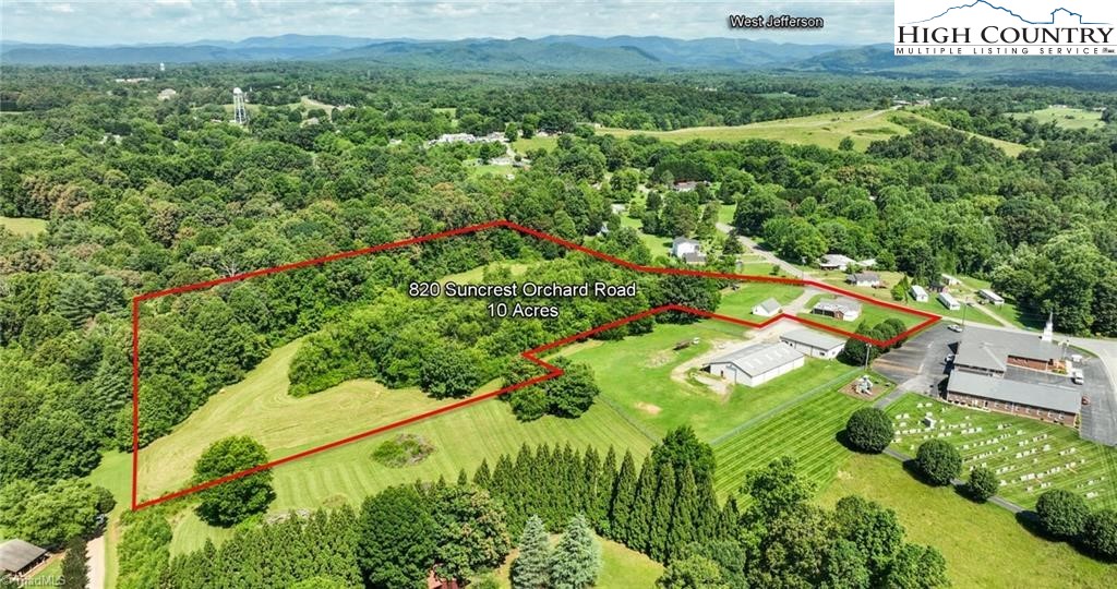 820 Suncrest Orchard Road North Wilkesboro, NC 28659 - Photo 15 of 41 a view of a bunch of plants and flowers