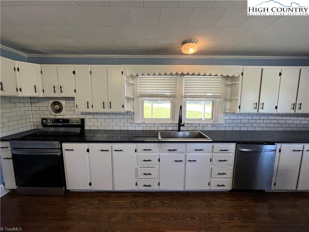 820 Suncrest Orchard Road North Wilkesboro, NC 28659 - Photo 20 of 41 a kitchen with granite countertop a sink and cabinets