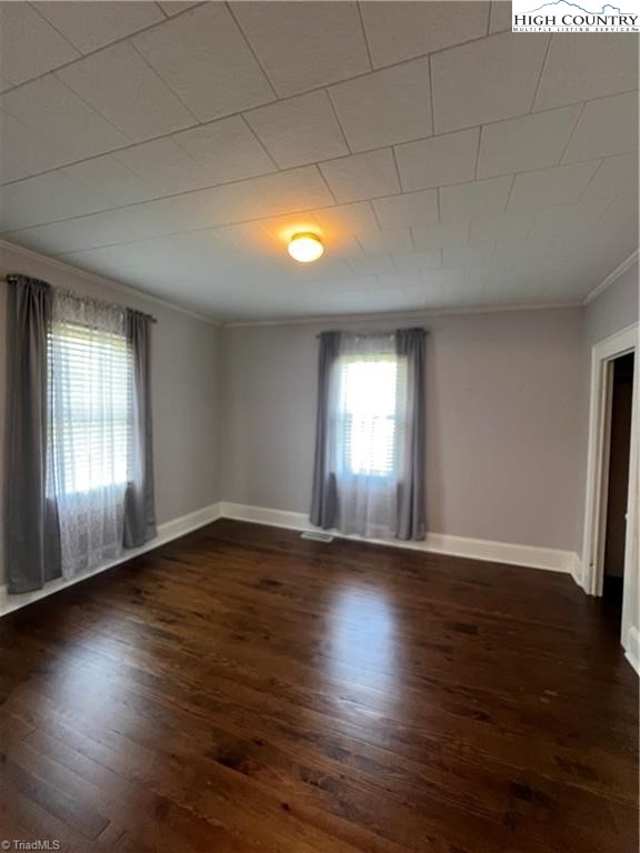 820 Suncrest Orchard Road North Wilkesboro, NC 28659 - Photo 31 of 41 a view of an empty room with wooden floor and a window
