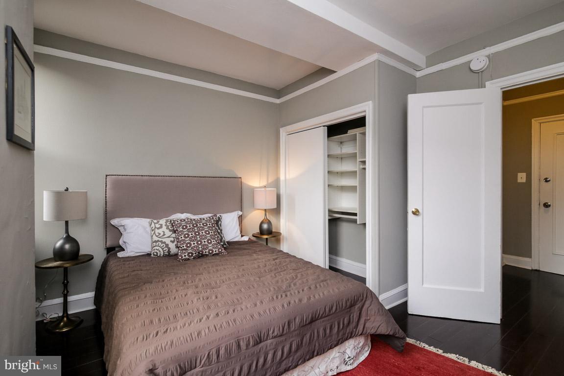 2031 Locust Street, Unit 203 Philadelphia, PA 19103 - Photo 7 of 17 a bedroom with a bed and walk in closet