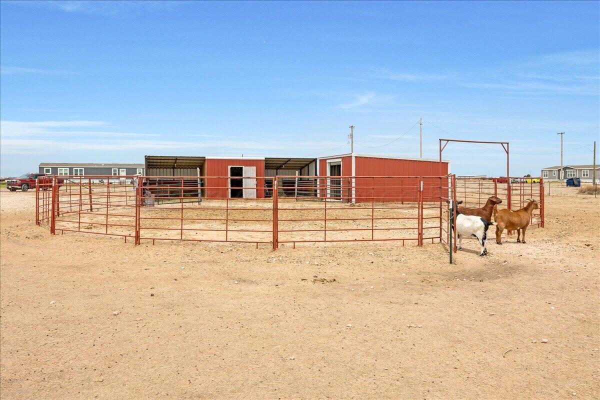 10551 Anderson Road Amarillo, TX 79118 - Photo 1 of 28 a view of a backyard of the house