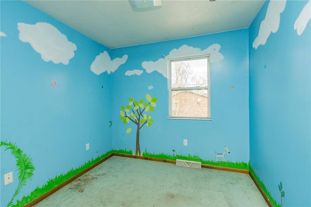 333 Butler Street Springdale, PA 15144 - Photo 14 of 17 a view of an empty room with a window