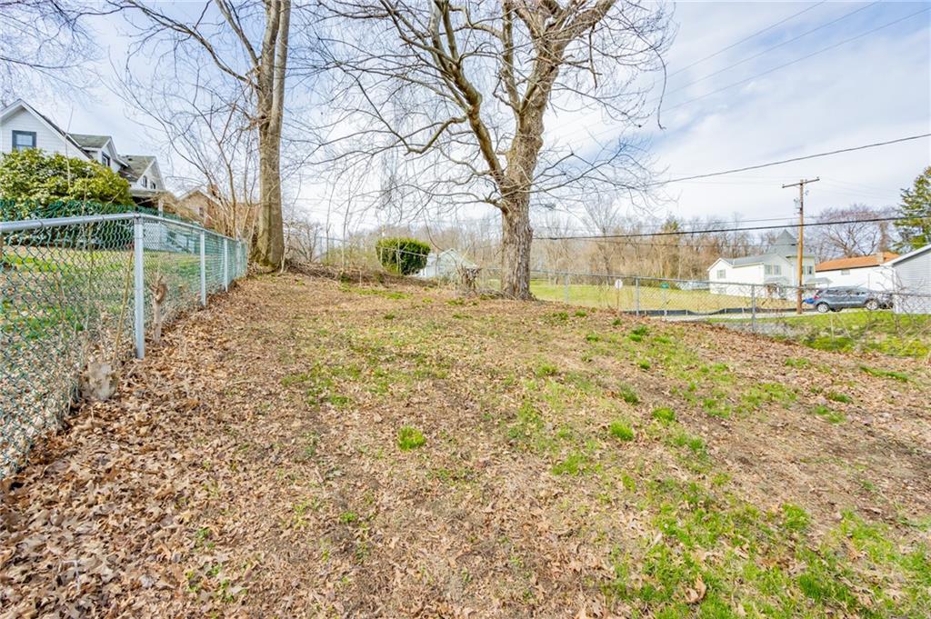 333 Butler Street Springdale, PA 15144 - Photo 4 of 17 a view of back yard of the house