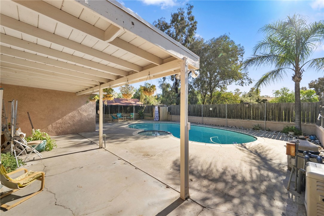 17465 Santa Rosa Mine Road Perris, CA 92570 - Photo 29 of 51 covered patio and pool/spa