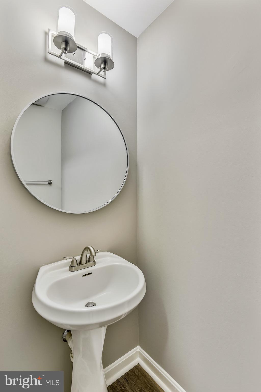 3810 Colony Point Place Edgewater, MD 21037 - Photo 13 of 61 Main floor powder room (1/2 bath)