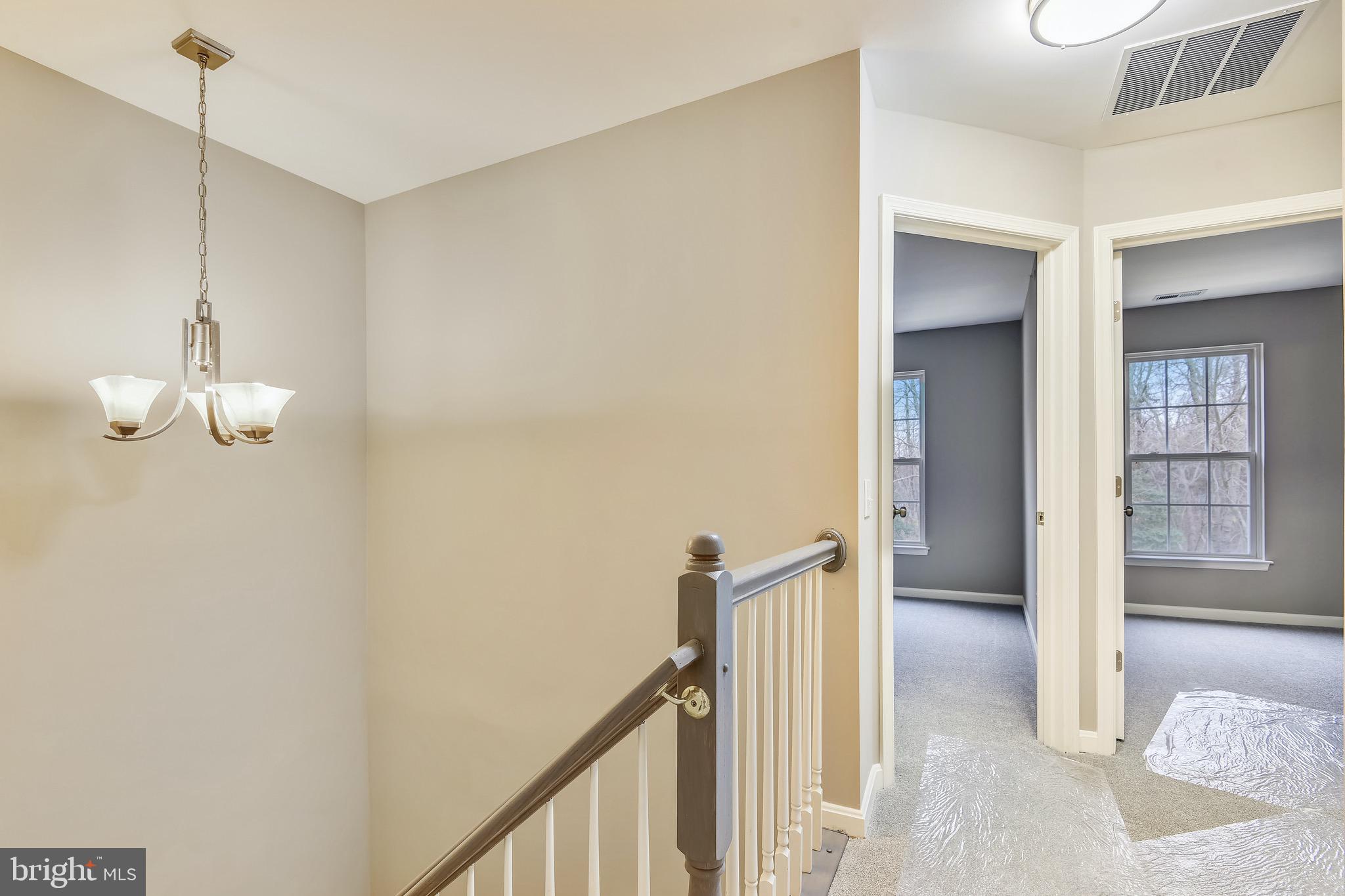 3810 Colony Point Place Edgewater, MD 21037 - Photo 15 of 61 Upper level hallway and landing