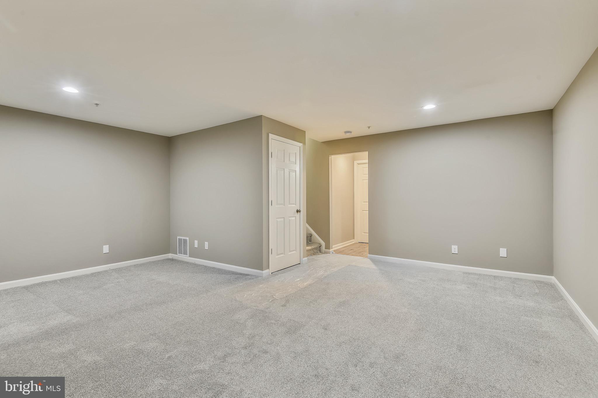 3810 Colony Point Place Edgewater, MD 21037 - Photo 30 of 61 Fully finished basement with fireplace