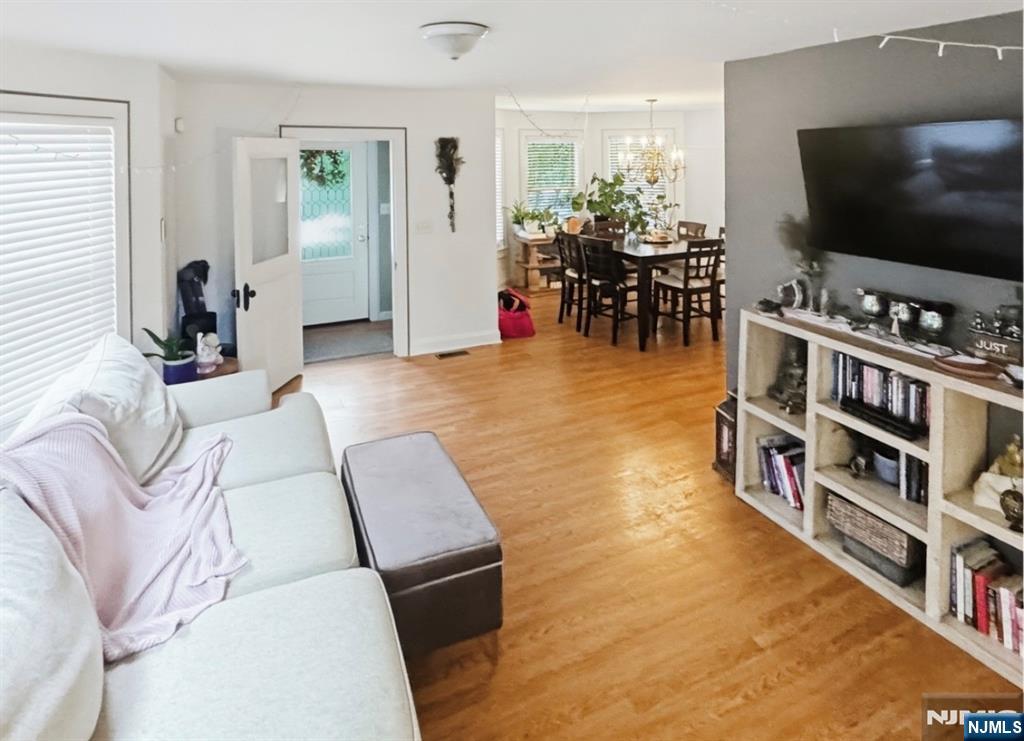 68 Washington Avenue Rutherford, NJ 07070 - Photo 5 of 23 a living room with furniture and a flat screen tv