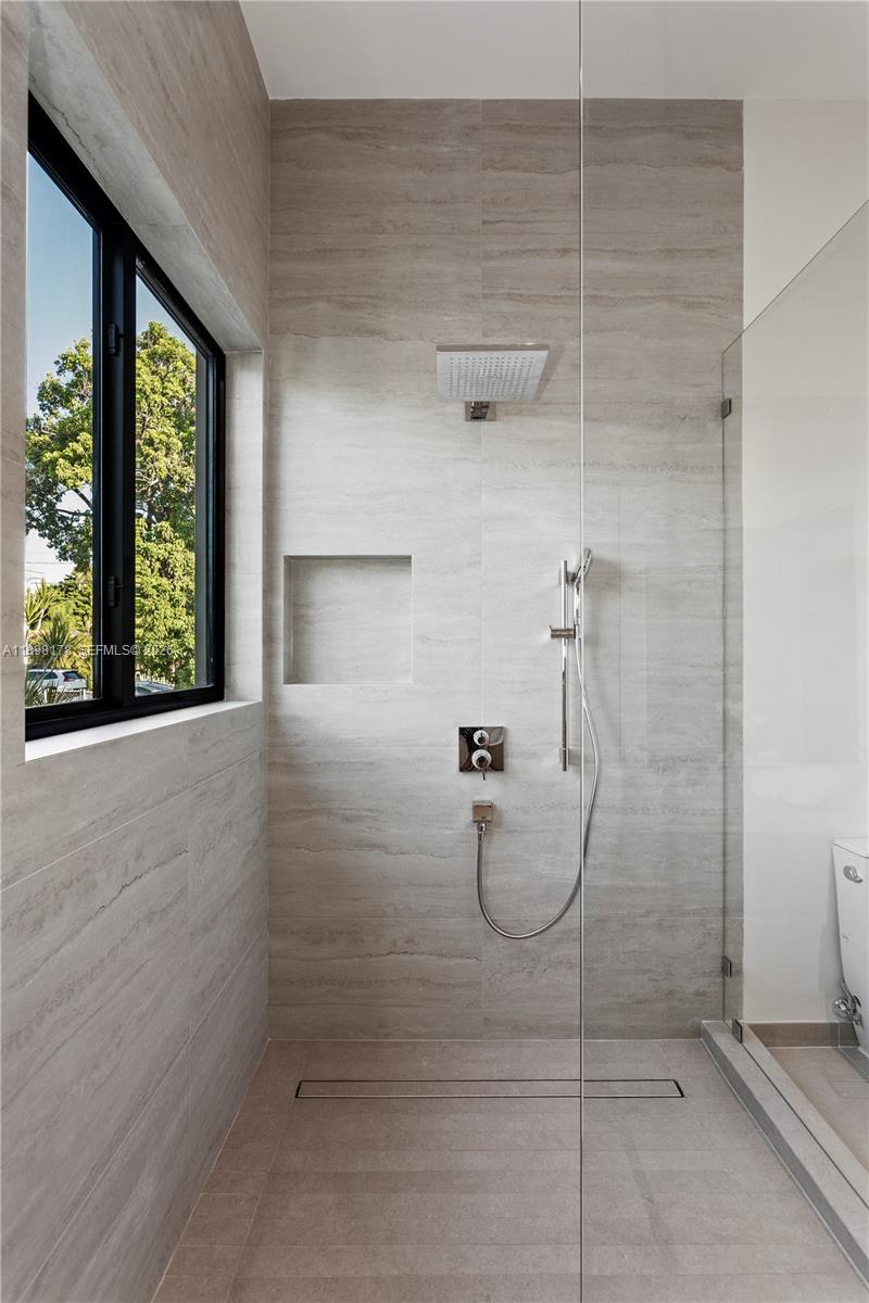 2434 Southwest 19th Street Miami, FL 33145 - Photo 12 of 18 a bathroom with a shower
