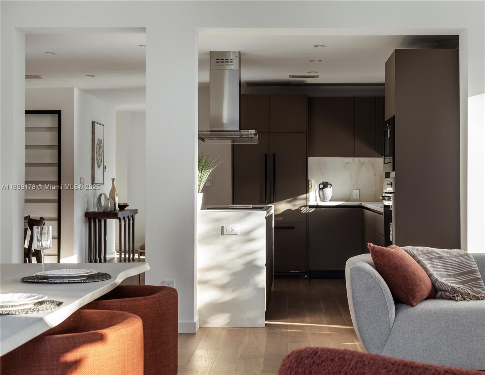 2434 Southwest 19th Street Miami, FL 33145 - Photo 5 of 18 a living room with furniture and a fireplace