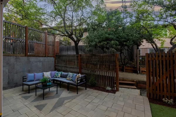 a view of a tennis ground with a pool