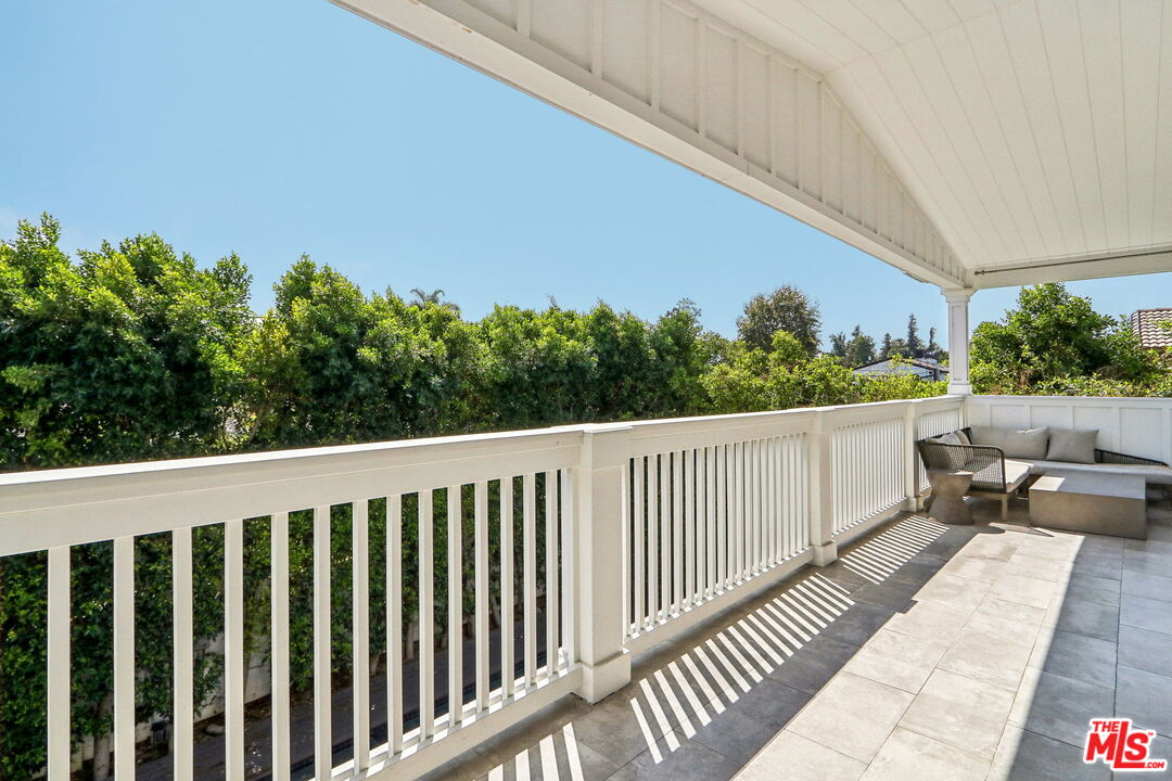 14000 Morrison Street Sherman Oaks, CA 91423 - Photo 21 of 34 a balcony with wooden floor