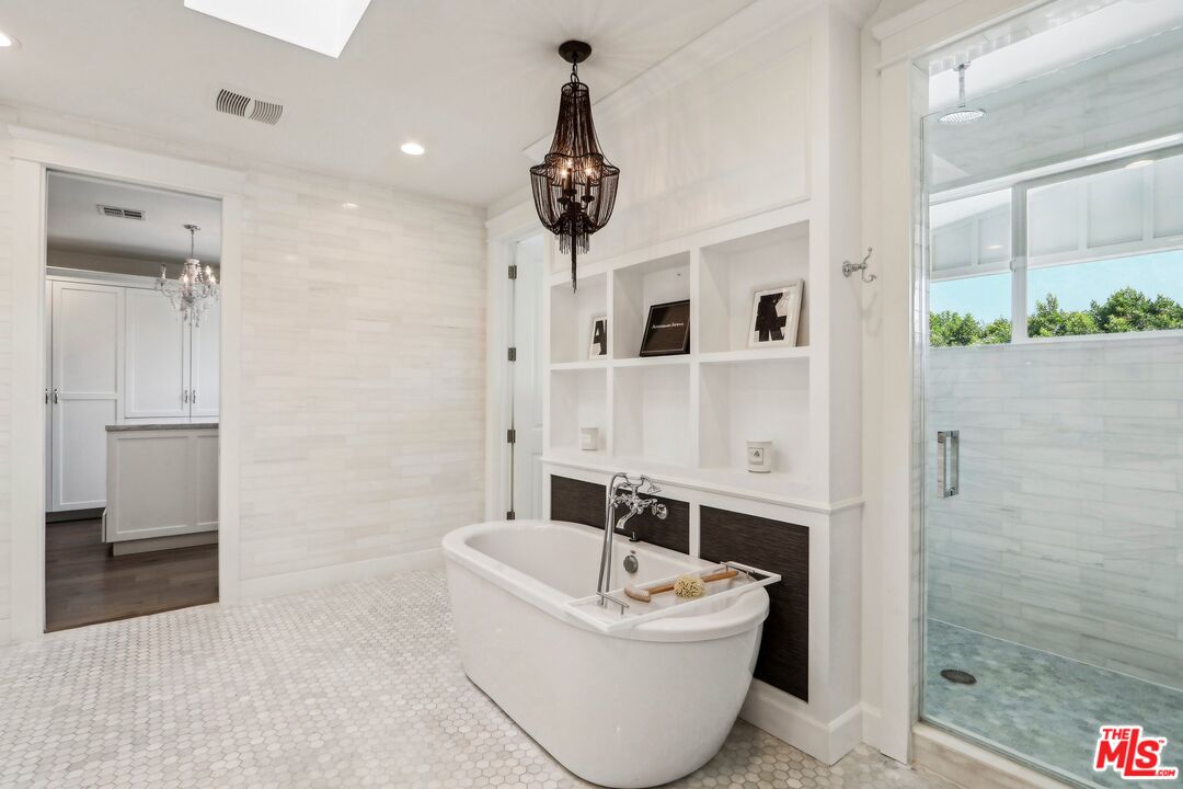 14000 Morrison Street Sherman Oaks, CA 91423 - Photo 23 of 34 a bathroom with a bathtub and shower