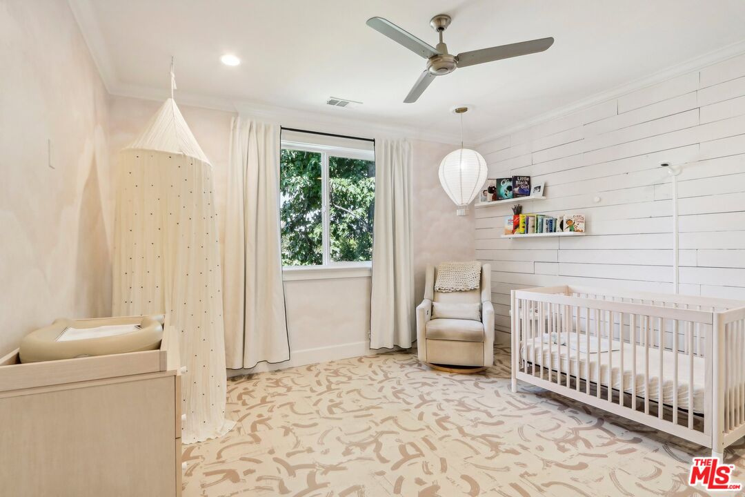 14000 Morrison Street Sherman Oaks, CA 91423 - Photo 26 of 34 a bedroom with furniture and a window