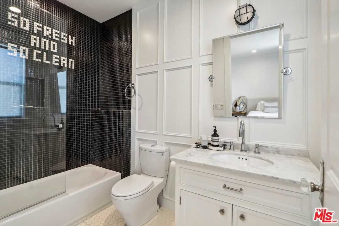14000 Morrison Street Sherman Oaks, CA 91423 - Photo 30 of 34 a bathroom with a sink a toilet and shower