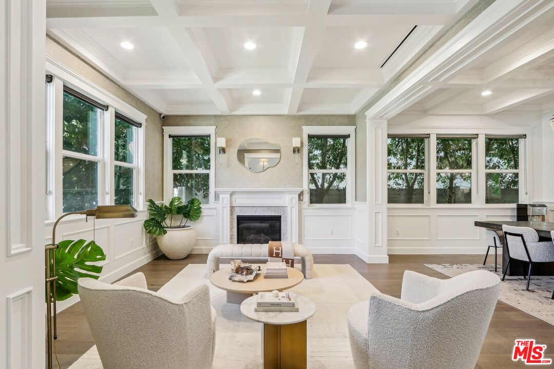 14000 Morrison Street Sherman Oaks, CA 91423 - Photo 3 of 34 a living room with fireplace furniture and a large window