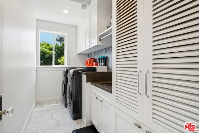 a view of a kitchen and a window