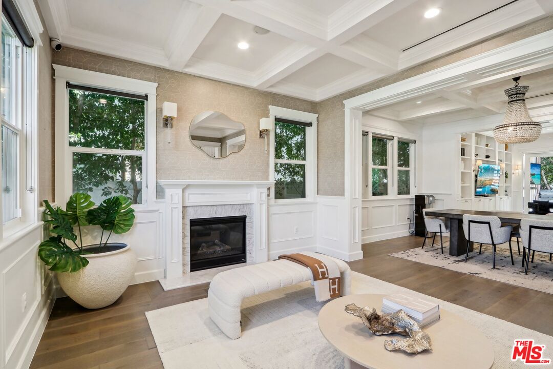 14000 Morrison Street Sherman Oaks, CA 91423 - Photo 5 of 34 a living room with furniture potted plant and a fireplace