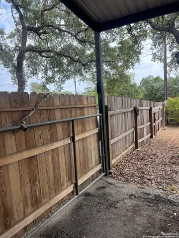 a view of a wooden fence