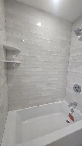 a bathroom with a bathtub
