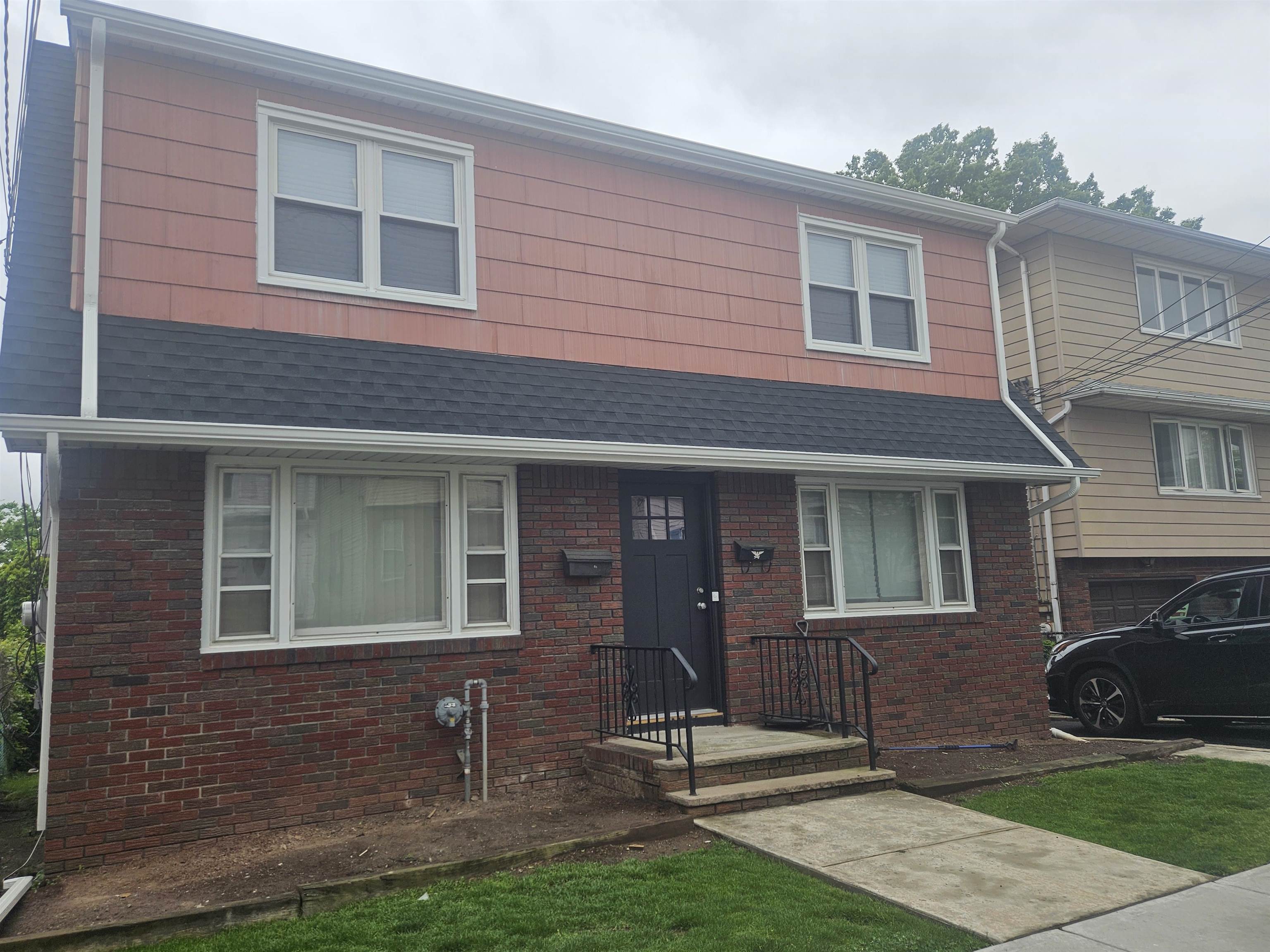 736 3rd Street, Unit 1 Secaucus, NJ 07094 - Photo 15 of 15 a front view of a house with garden