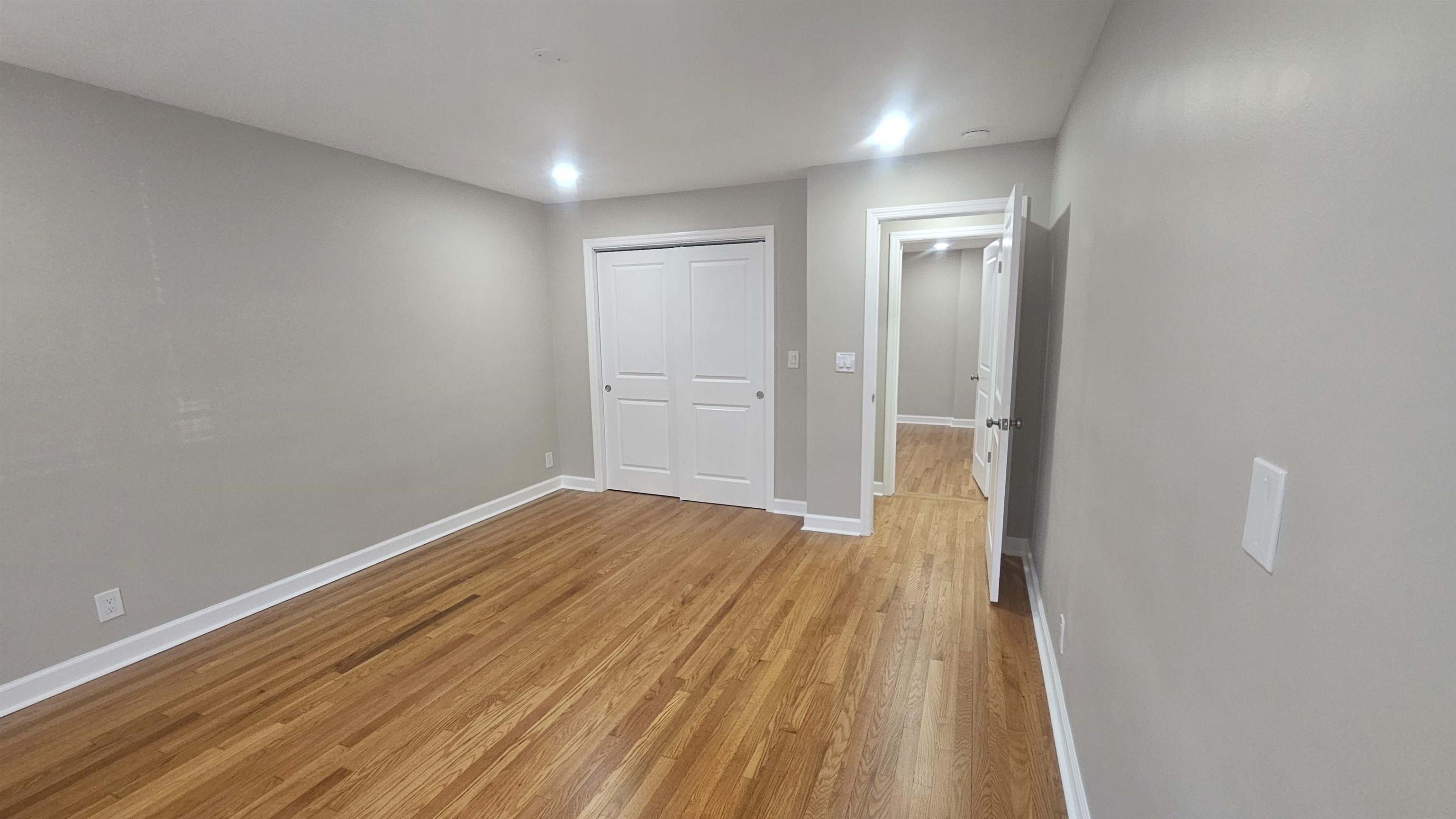 736 3rd Street, Unit 1 Secaucus, NJ 07094 - Photo 4 of 15 a view of empty room with wooden floor