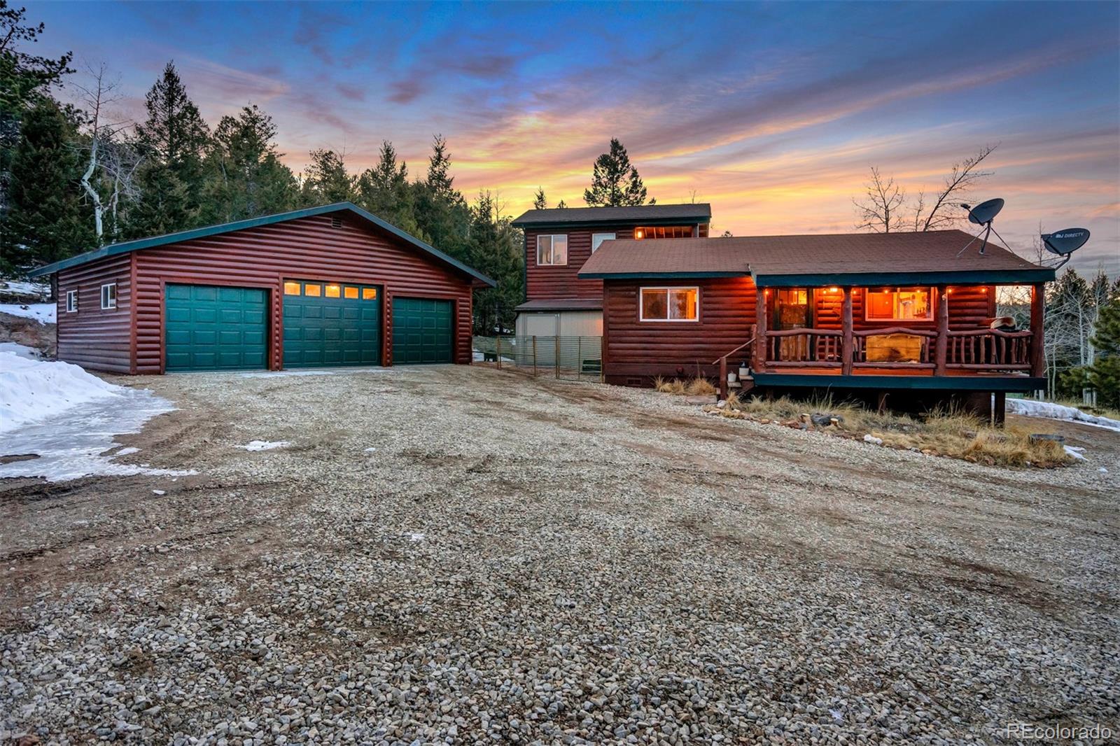 10424 Ranch Road Hartsel, CO 80449 - Photo 1 of 31 a front view of a house with a yard