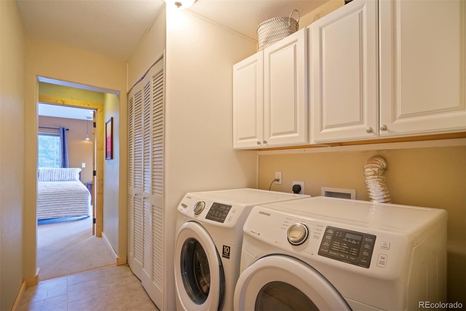 10424 Ranch Road Hartsel, CO 80449 - Photo 13 of 31 a utility room with dryer and washer