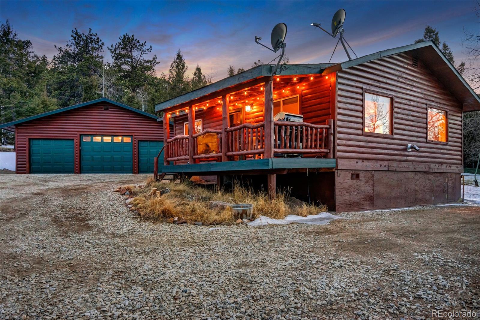 10424 Ranch Road Hartsel, CO 80449 - Photo 2 of 31 a front view of a house with a yard