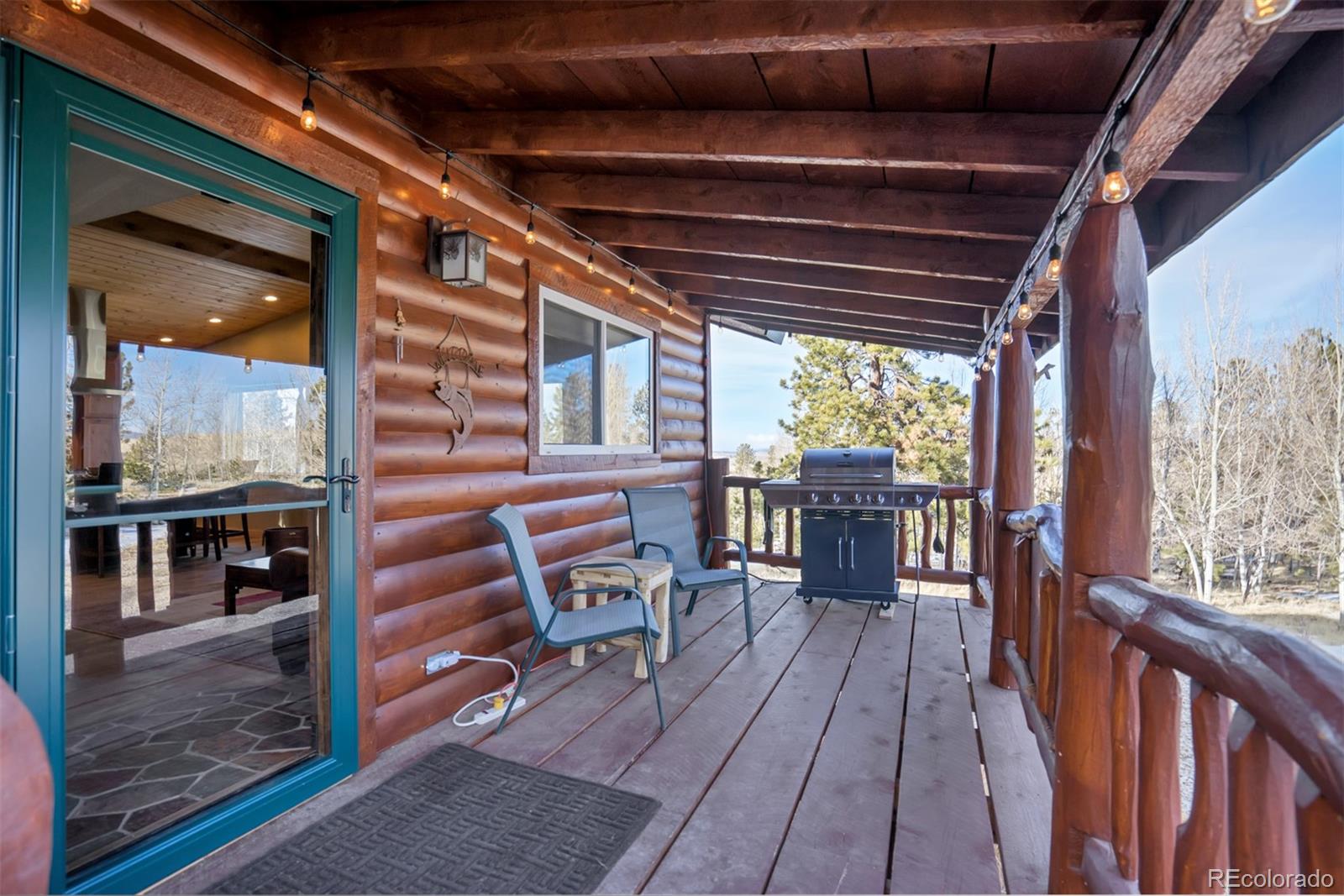 10424 Ranch Road Hartsel, CO 80449 - Photo 3 of 31 a view of a chairs and table in the balcony