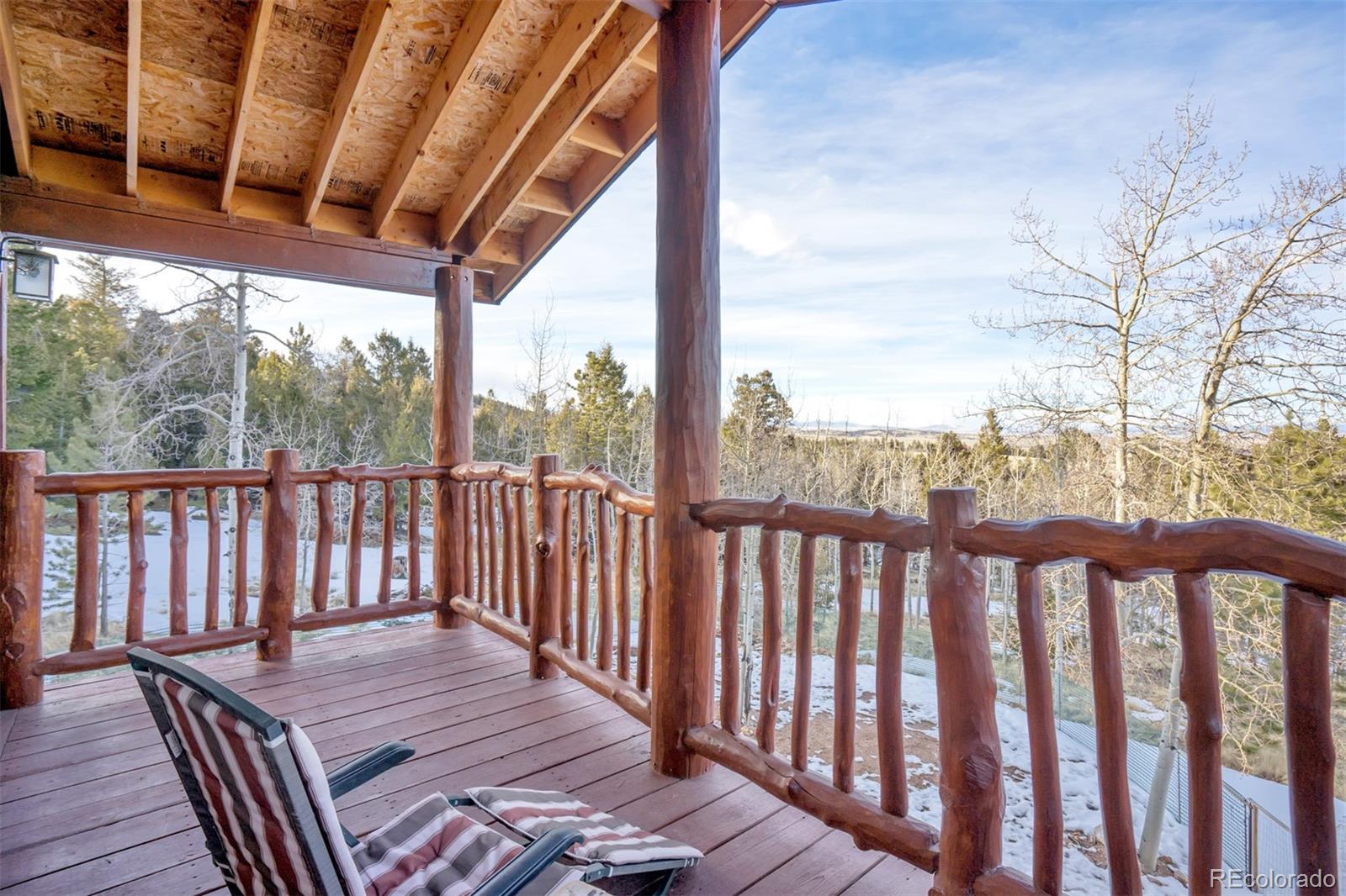 10424 Ranch Road Hartsel, CO 80449 - Photo 4 of 31 a view of a wooden deck