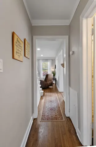 a bedroom with bed and a window