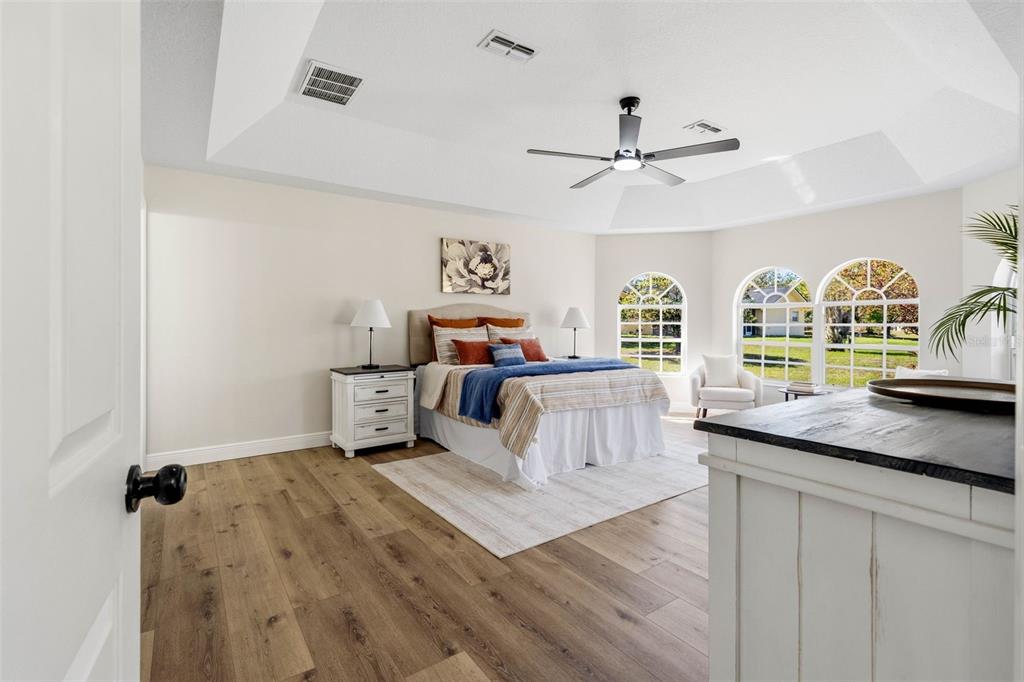 10185 Sleepy Willow Court Spring Hill, FL 34608 - Photo 21 of 44 a living room with furniture and a large window