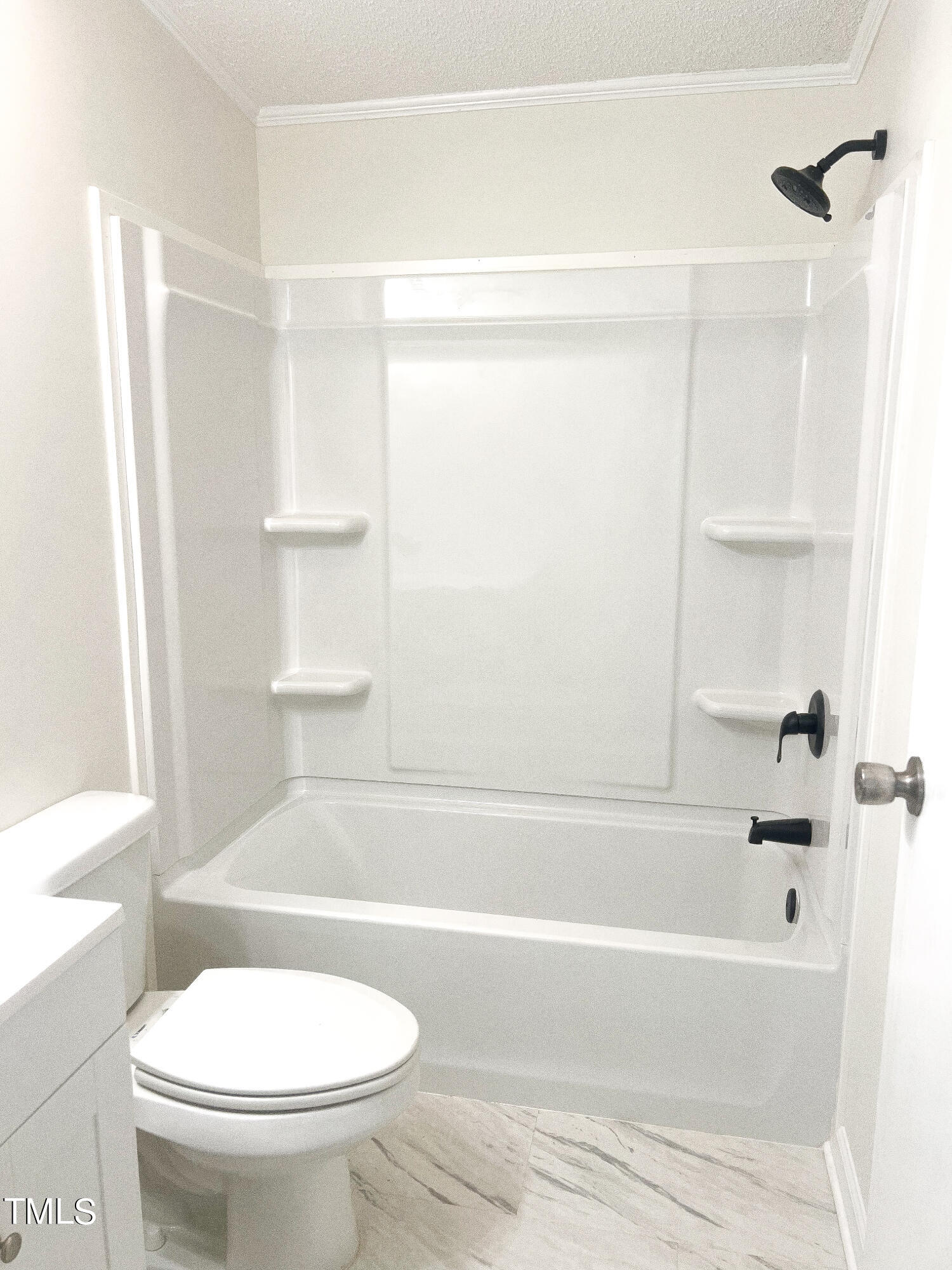 364 Moody Loop Road Siler City, NC 27344 - Photo 14 of 20 a bathroom with a toilet and a bathtub