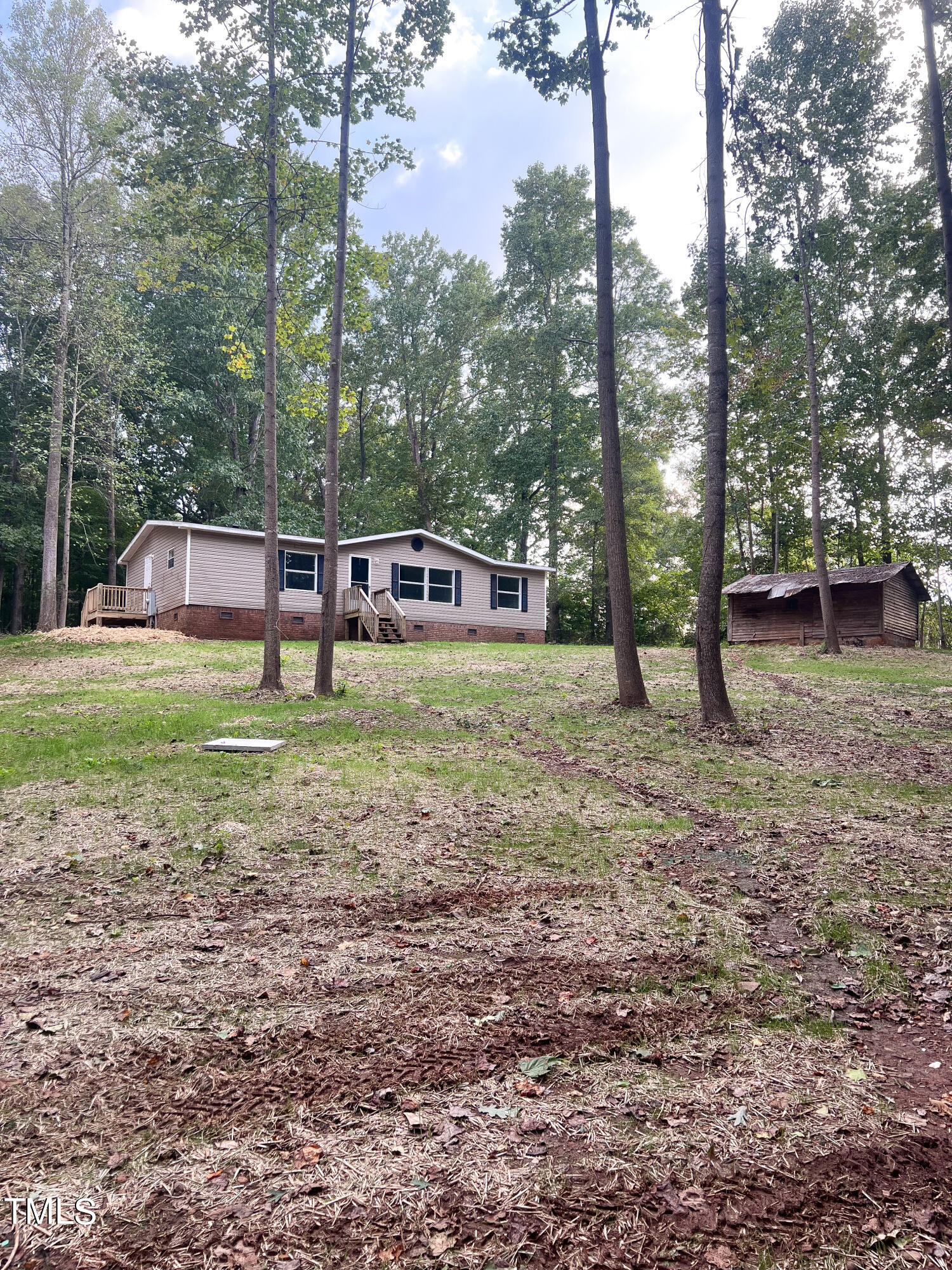 364 Moody Loop Road Siler City, NC 27344 - Photo 2 of 20 a view of a house with yard and sitting area
