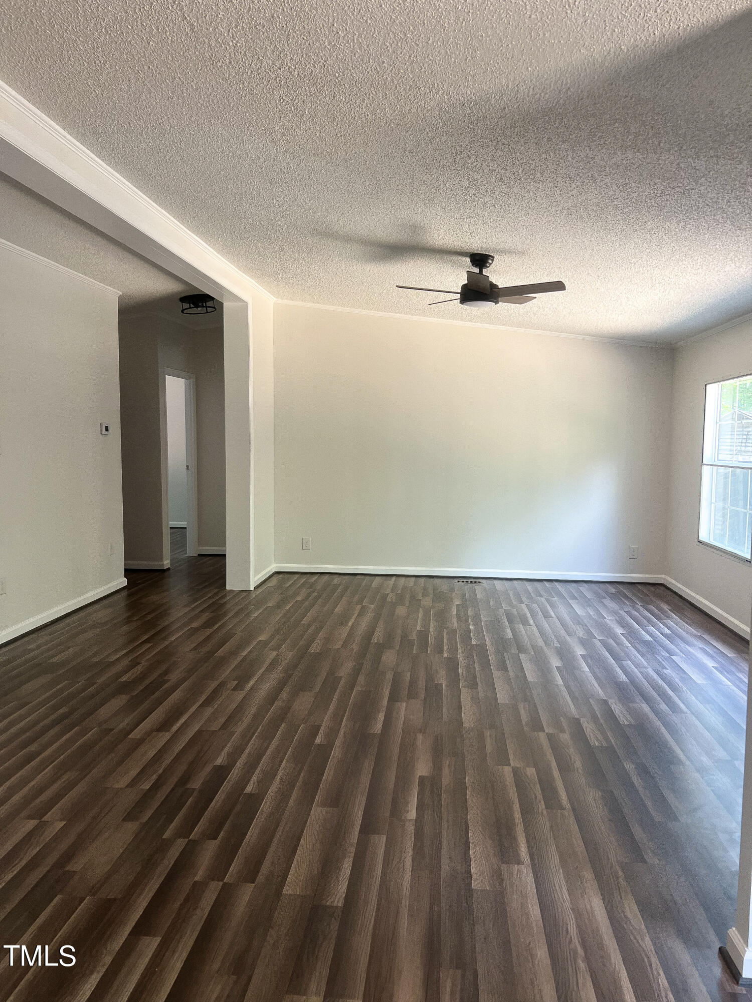 364 Moody Loop Road Siler City, NC 27344 - Photo 6 of 20 wooden floor in an empty room with a window