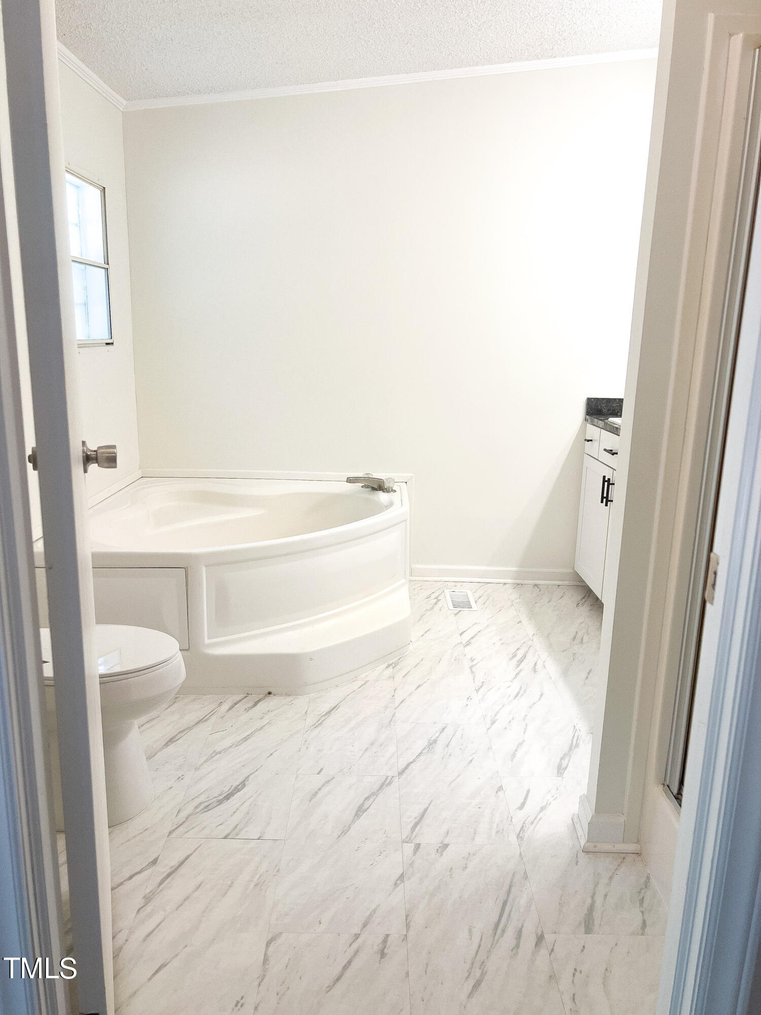 364 Moody Loop Road Siler City, NC 27344 - Photo 8 of 20 a bathroom with a bathtub and a toilet
