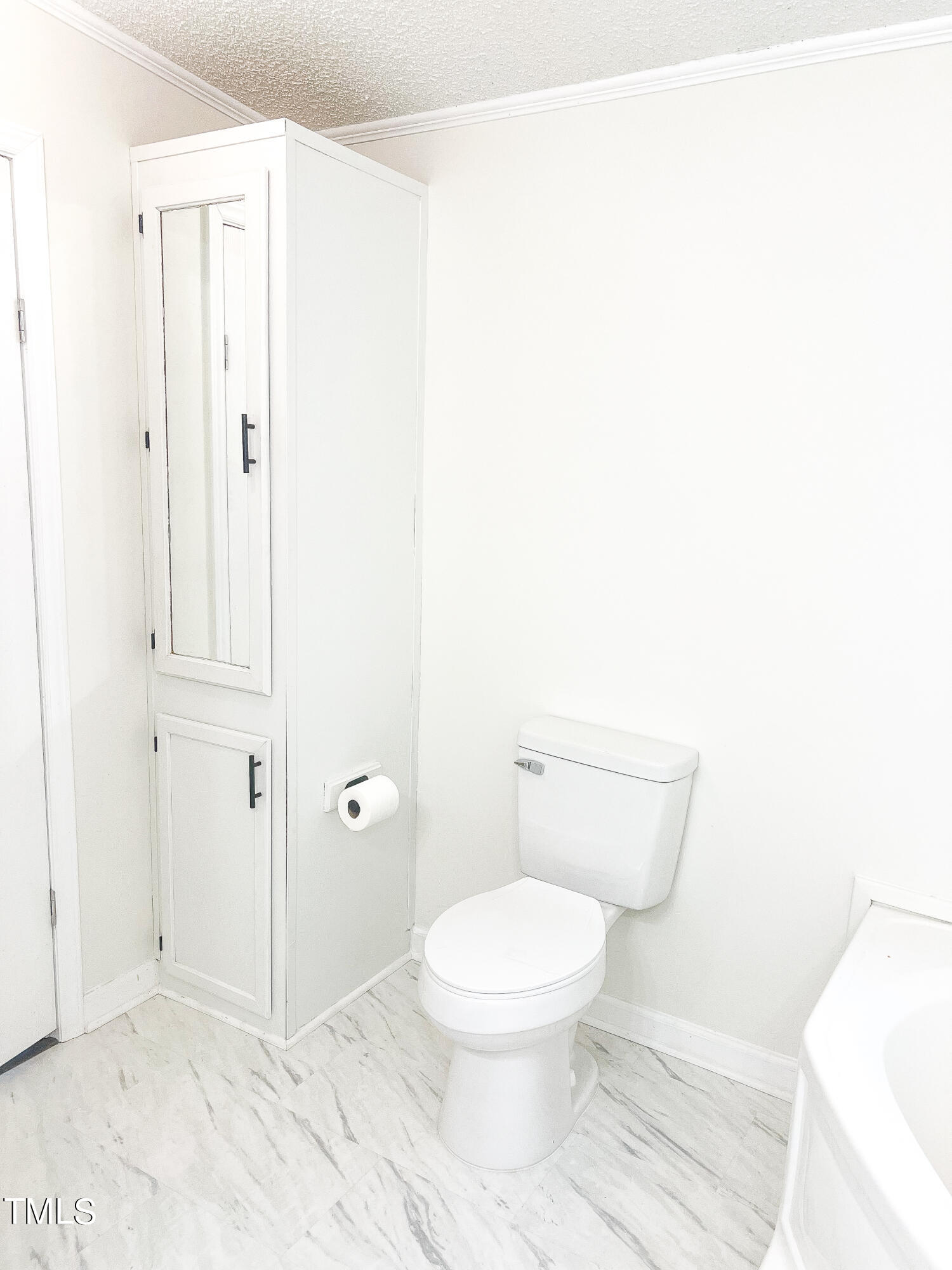364 Moody Loop Road Siler City, NC 27344 - Photo 9 of 20 a white toilet sitting next to a bathroom sink